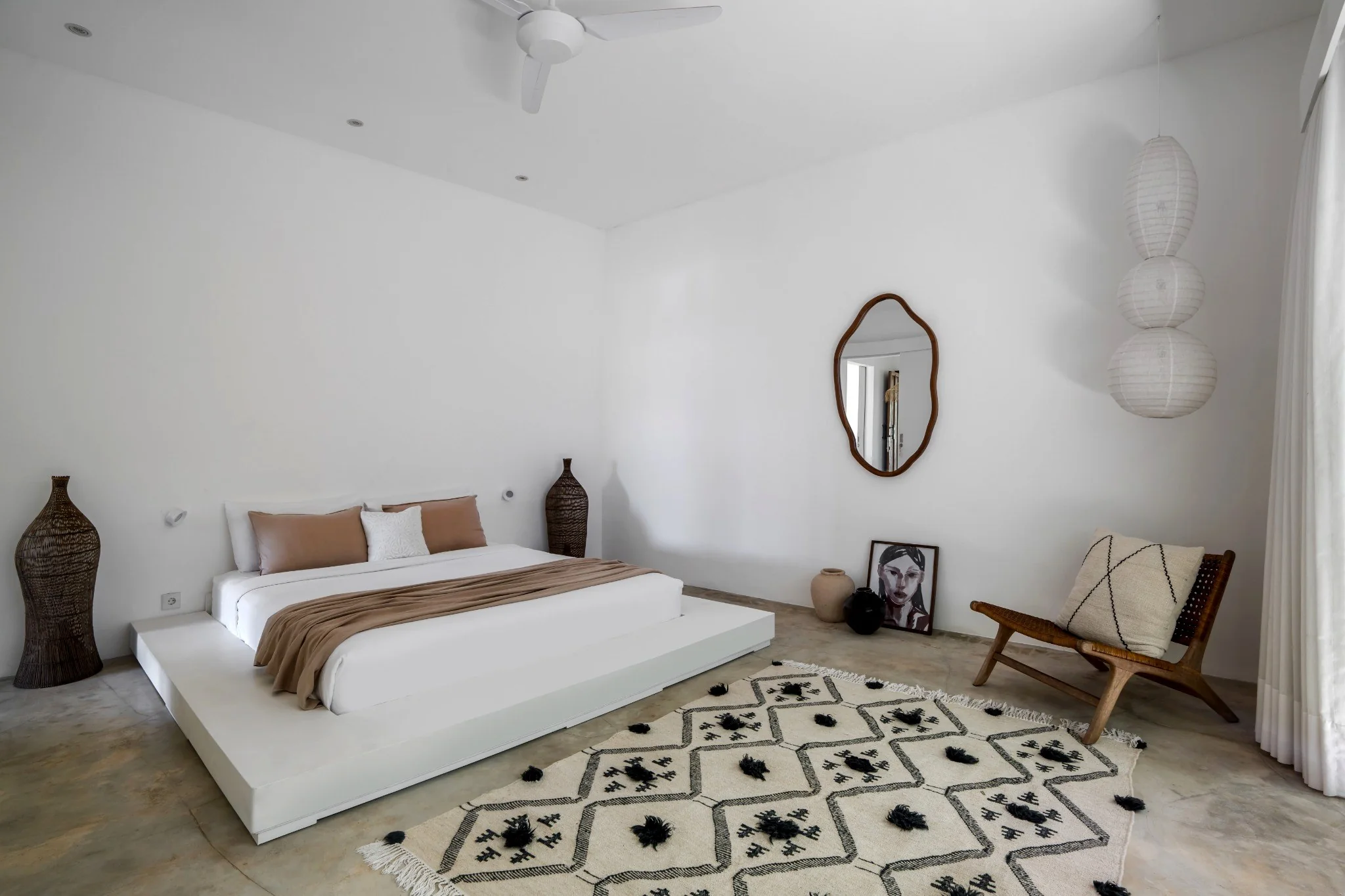Second bedroom at Loft Ithaka with platform bed and natural textures